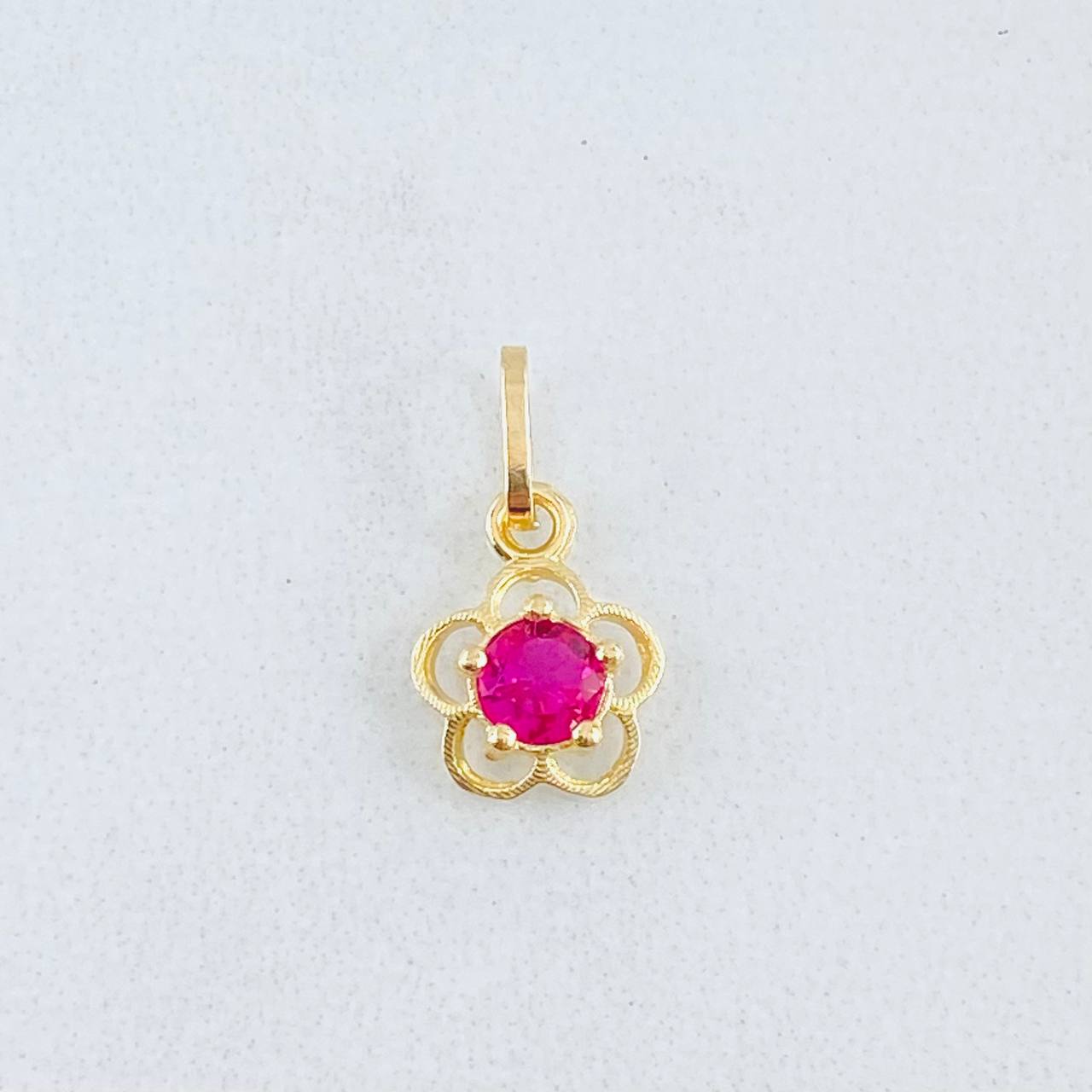 Dije Flor  0.4gr / 1/2 in / Oro Amarillo 18K