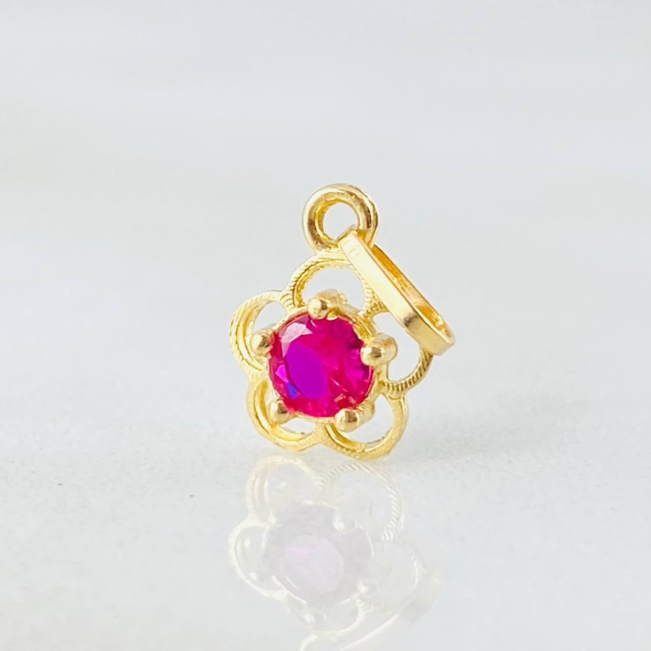 Dije Flor  0.4gr / 1/2 in / Oro Amarillo 18K