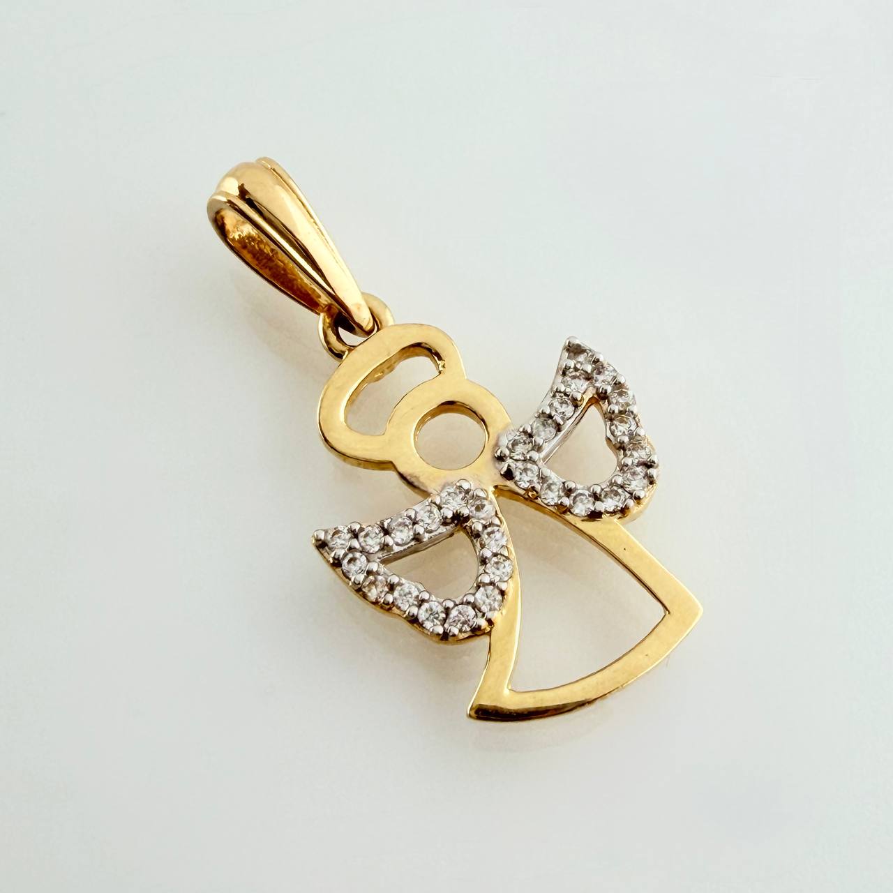 Dije Angel 1.65gr / 1 in / Dos Oros Amarillo Blanco 18K %