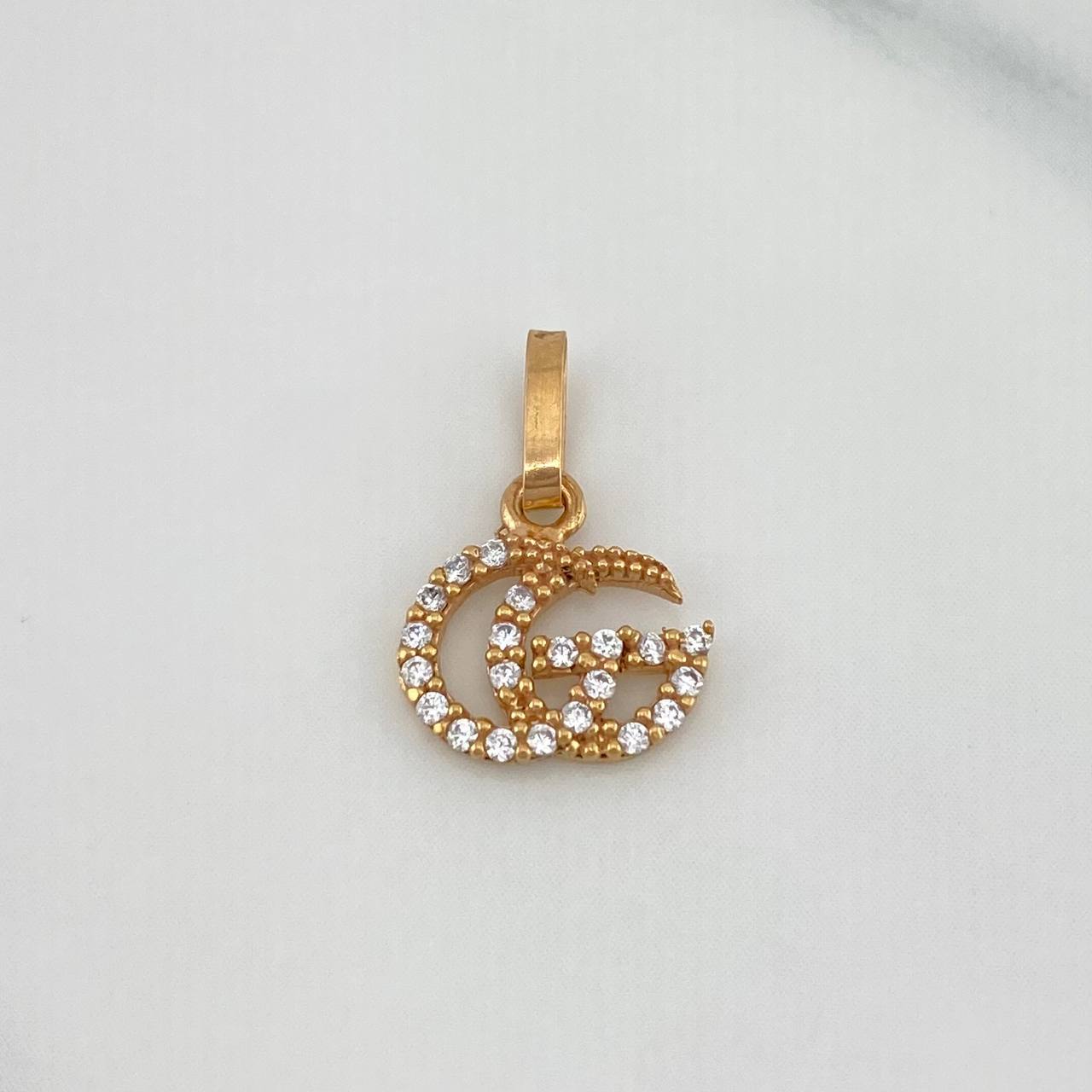 Dije Gg 0.55 g / 1/2 in Oro Rosa 18K