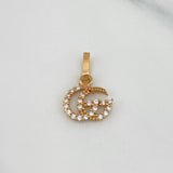 Dije Gg 0.55 g / 1/2 in Oro Rosa 18K