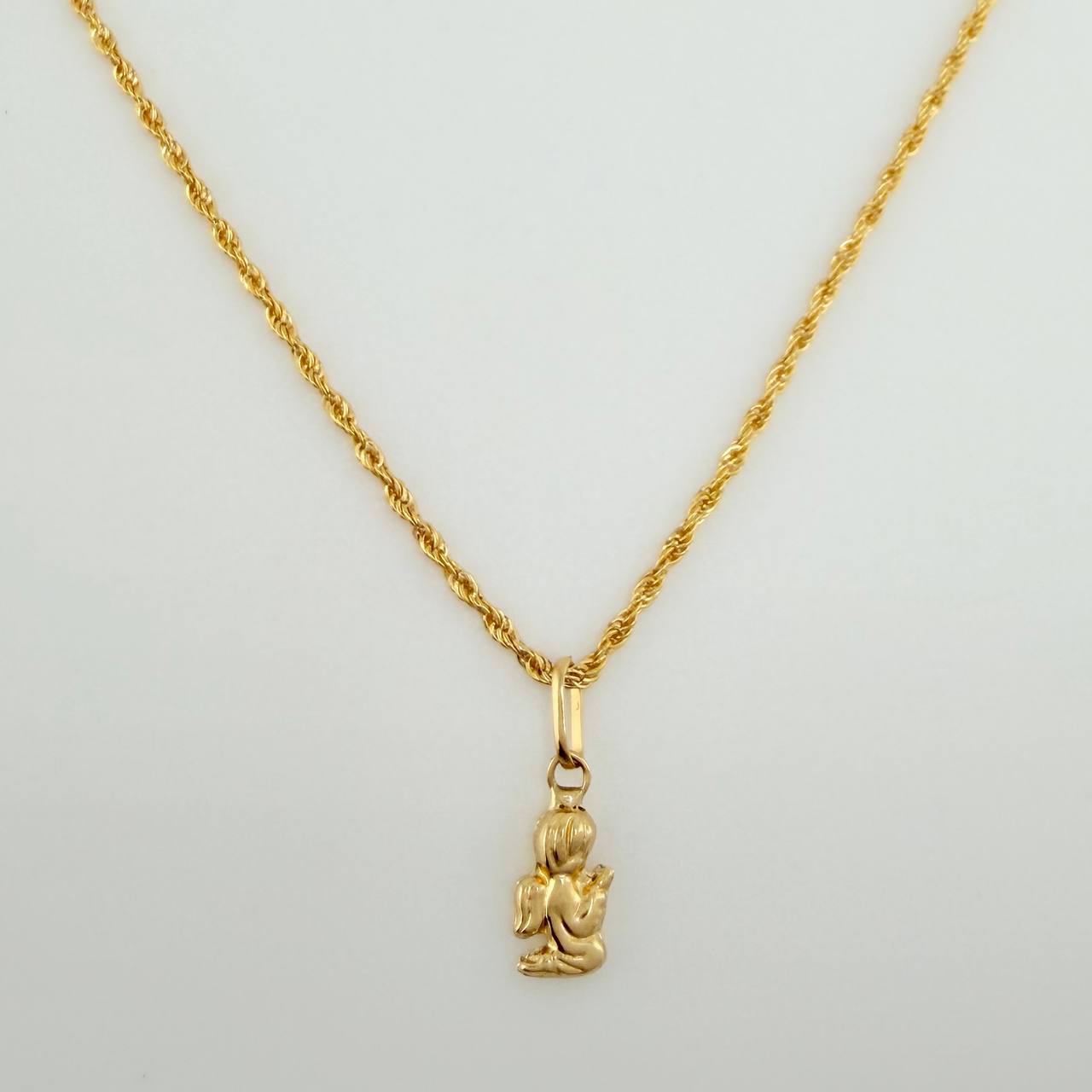 Set Cadena y Dije Lazo + Angel De La Guarda 1.3gr / 20 1/4 in / 1.15mm Oro Amarillo 18K $