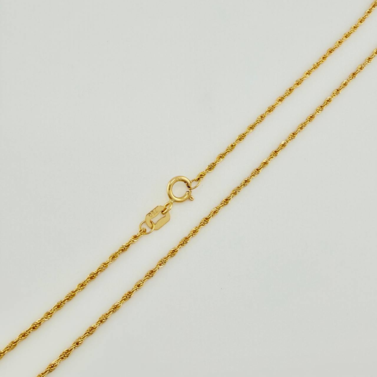 Set Cadena y Dije Lazo + Angel De La Guarda 1.25gr / 19 3/4 in / 1.12mm Oro Amarillo 18K $