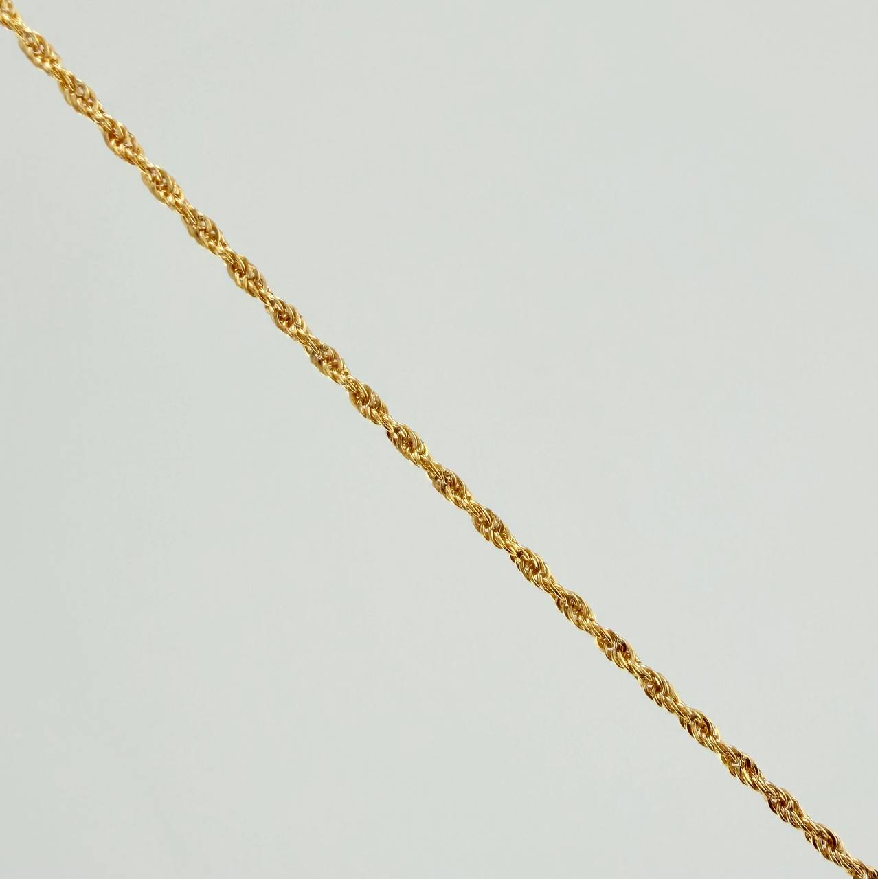 Set Cadena y Dije Lazo + Angel De La Guarda 1.25gr / 19 3/4 in / 1.12mm Oro Amarillo 18K $