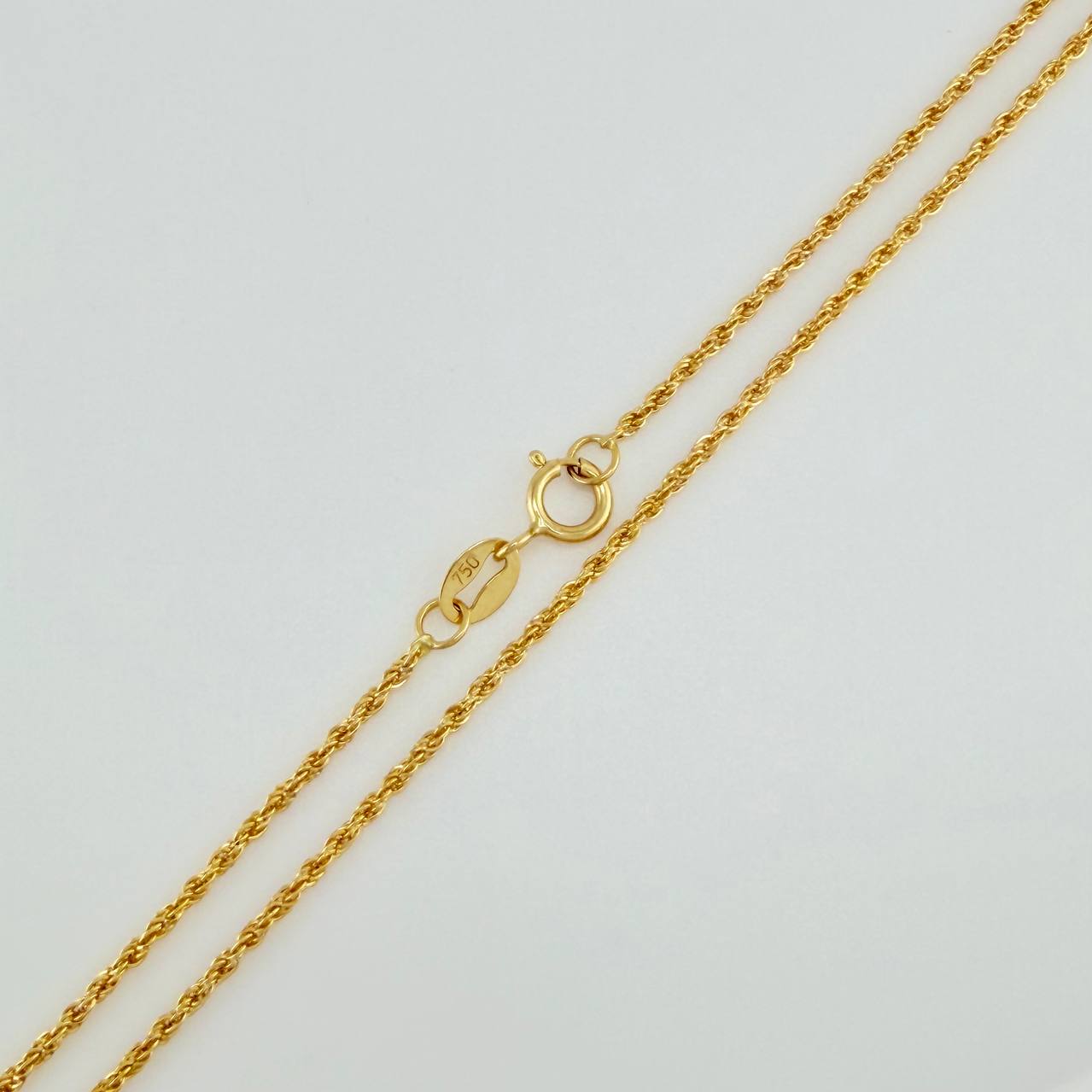 Set Cadena y Dije Lazo + Angel De La Guarda 1.3gr / 20 1/4 in / 1.15mm Oro Amarillo 18K $