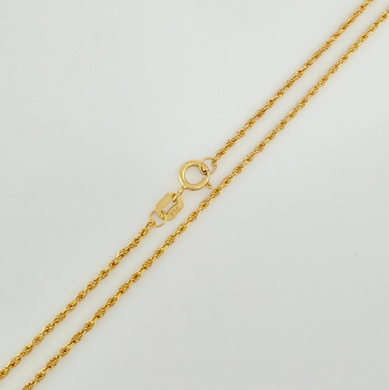 Set Cadena y Dije Lazo + San Benito 1.4gr / 19 3/4 in / 1.09mm Oro Amarillo 18K $