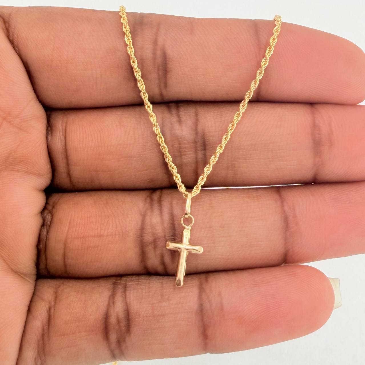 Set Cadena y Dije Lazo + Cruz 1.25gr / 19 3/4 in / 1.08mm Oro Amarillo 18K $