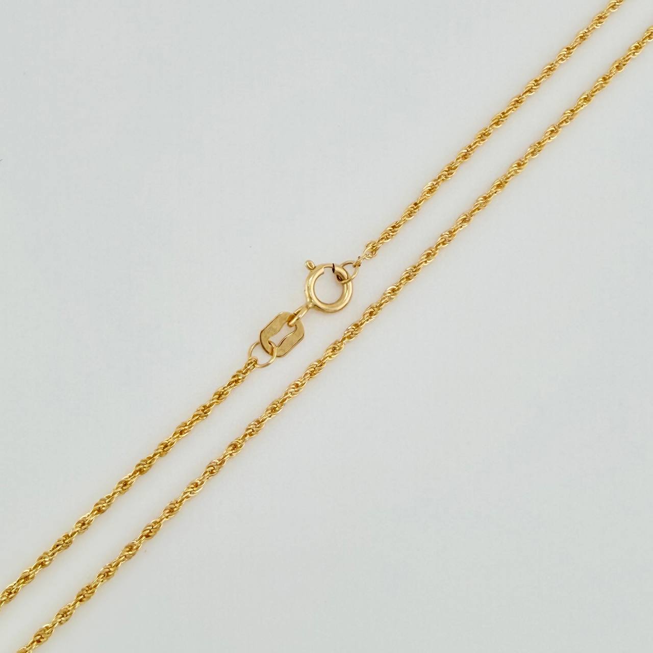 Set Cadena y Dije Lazo + Cruz 1.2gr / 19 3/4 in / 1.12mm Oro Amarillo 18K $