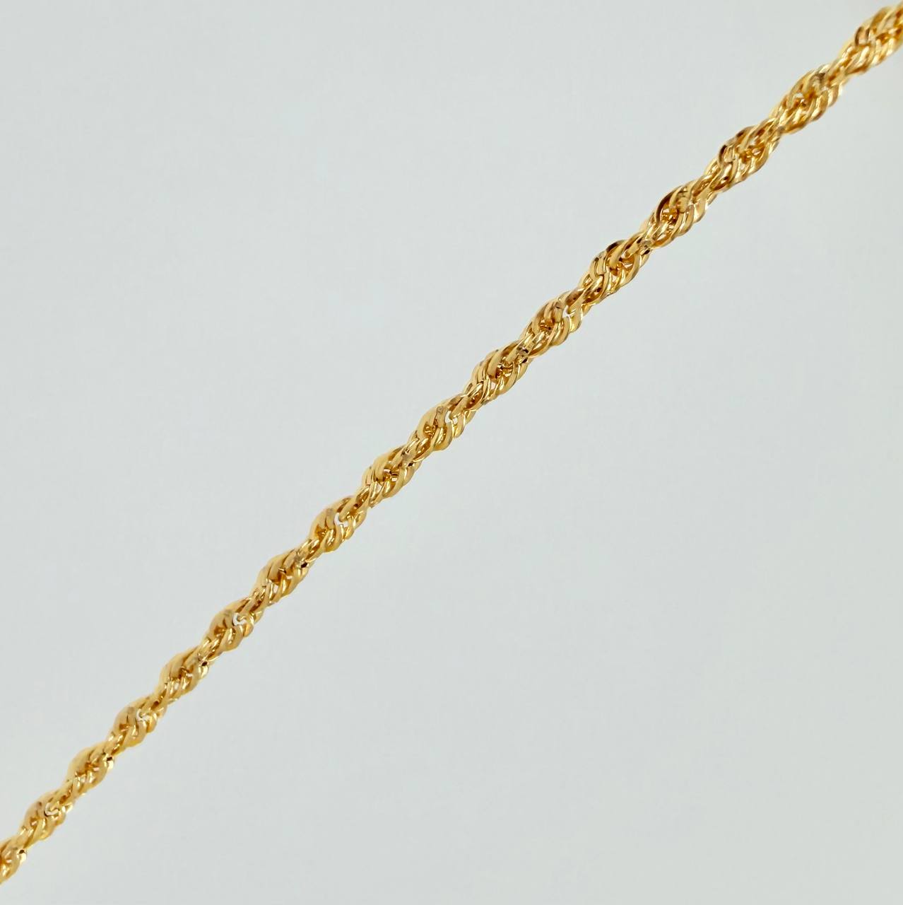 Set Cadena y Dije Lazo + Cruz 1.25gr / 19 3/4 in / 1.08mm Oro Amarillo 18K $