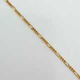 Set Cadena y Dije Figaro + Cruz 1.7gr / 19 3/4 in / 1.25mm Oro Amarillo 18K $