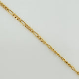 Set Cadena y Dije Figaro + San Benito 1.85gr / 19 3/4 in / 1.27mm Oro Amarillo 18K $