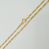 Set Cadena y Dije Figaro + San Benito 1.85gr / 19 3/4 in / 1.27mm Oro Amarillo 18K $