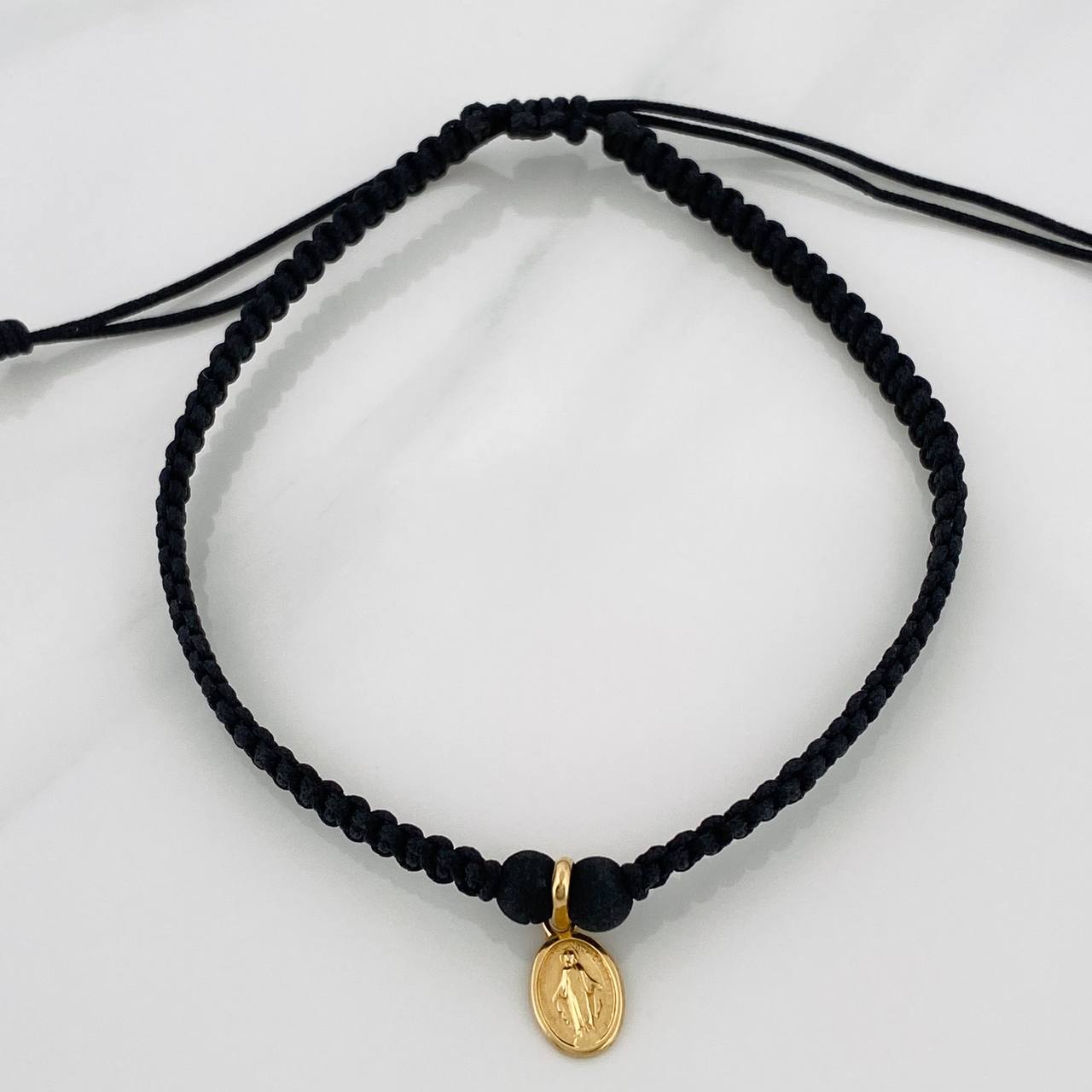 Pulsera Tejida Negra Virgen Milagrosa 0.55gr / Oro Amarillo 18K %