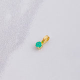 Dije Redondo Esmeralda 5pts 0.15g / 1/4 in Oro Amarillo 18K
