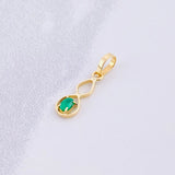 Dije Infinito Esmeralda 6pts 0.3g / 3/4 in Oro Amarillo 18K