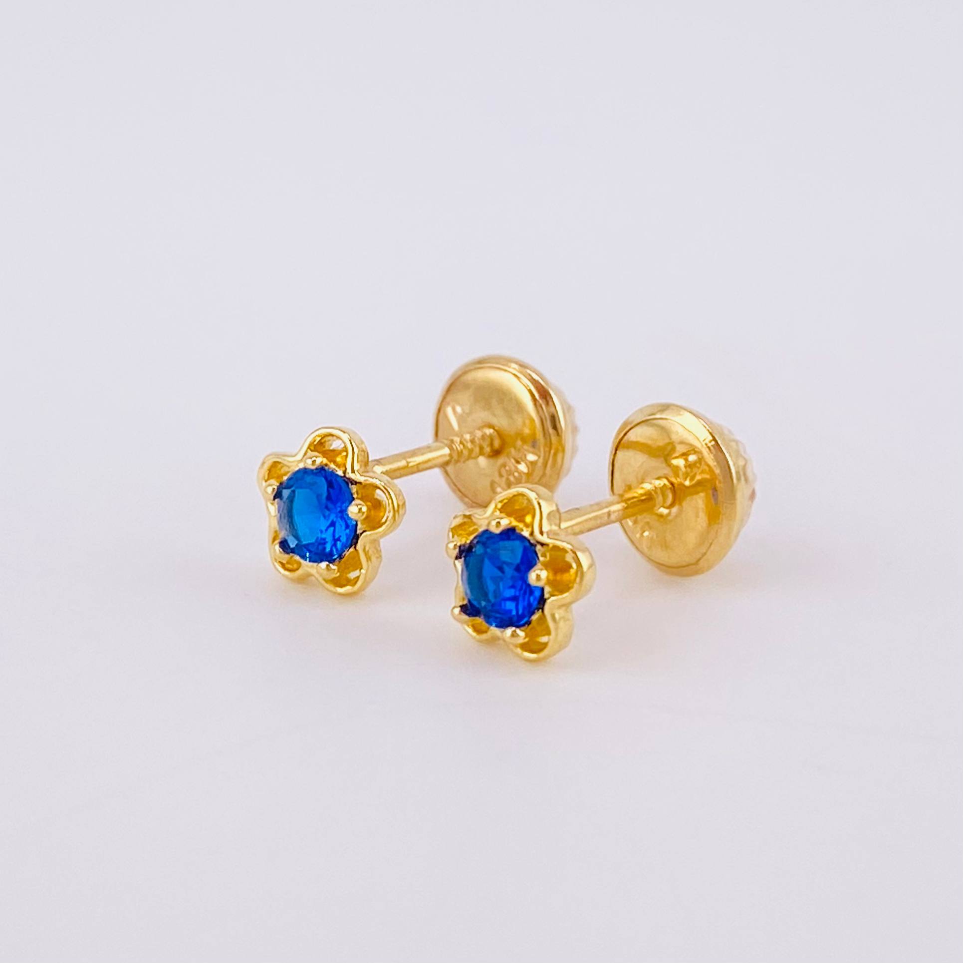 Topos Flor 0.9gr / Oro 18K ©