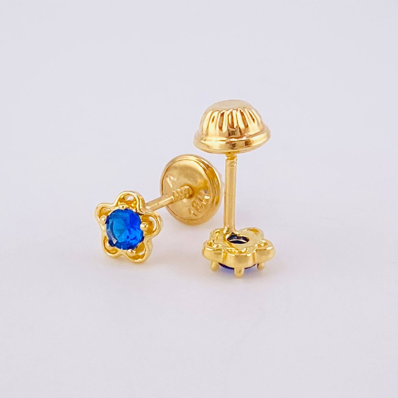 Topos Flor 0.9gr / Oro 18K ©