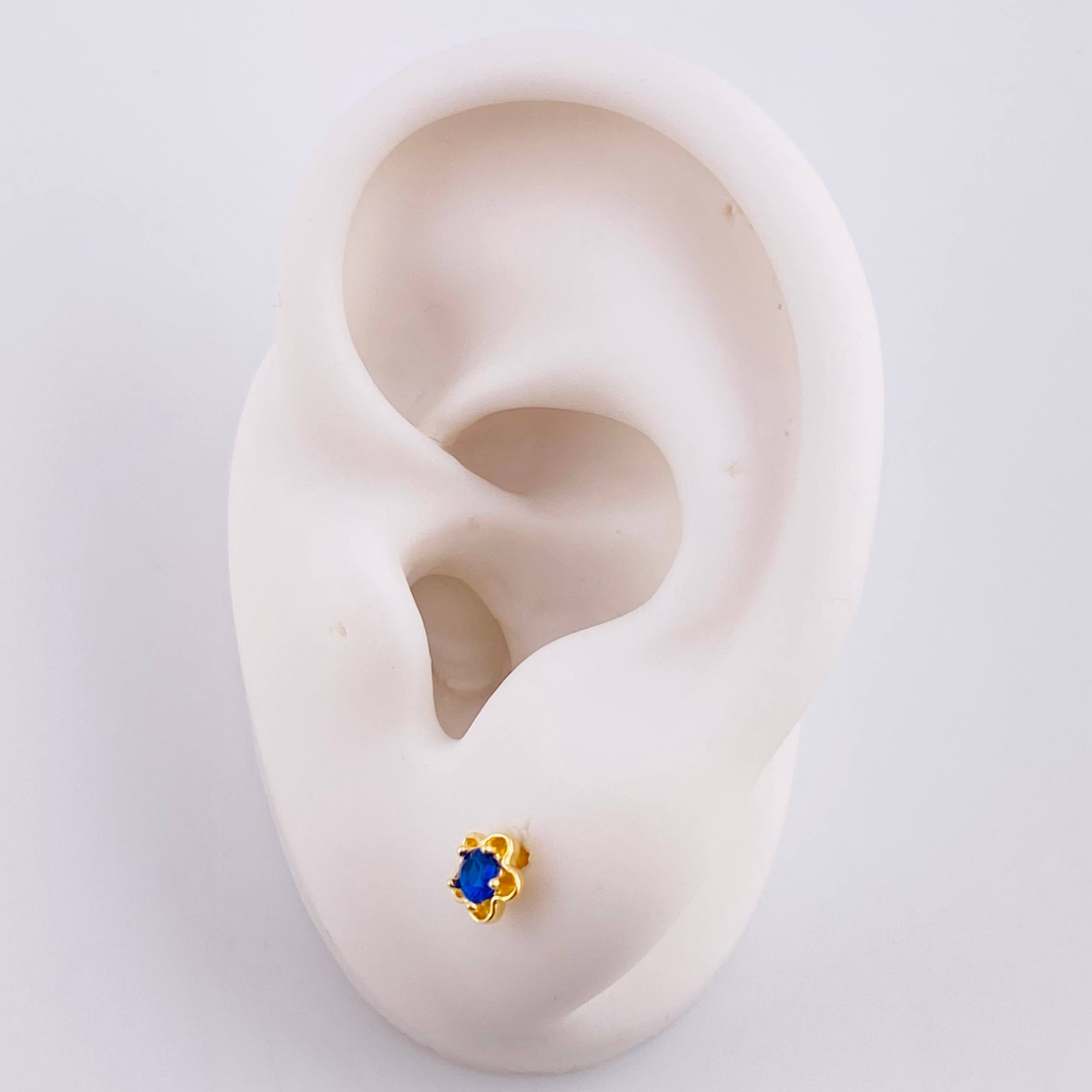 Topos Flor 0.9gr / Oro 18K ©