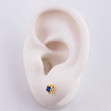 Topos Flor 0.9gr / Oro 18K ©