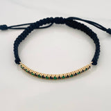 Pulsera Tejida Negra Tennis Oro Amarillo 18K