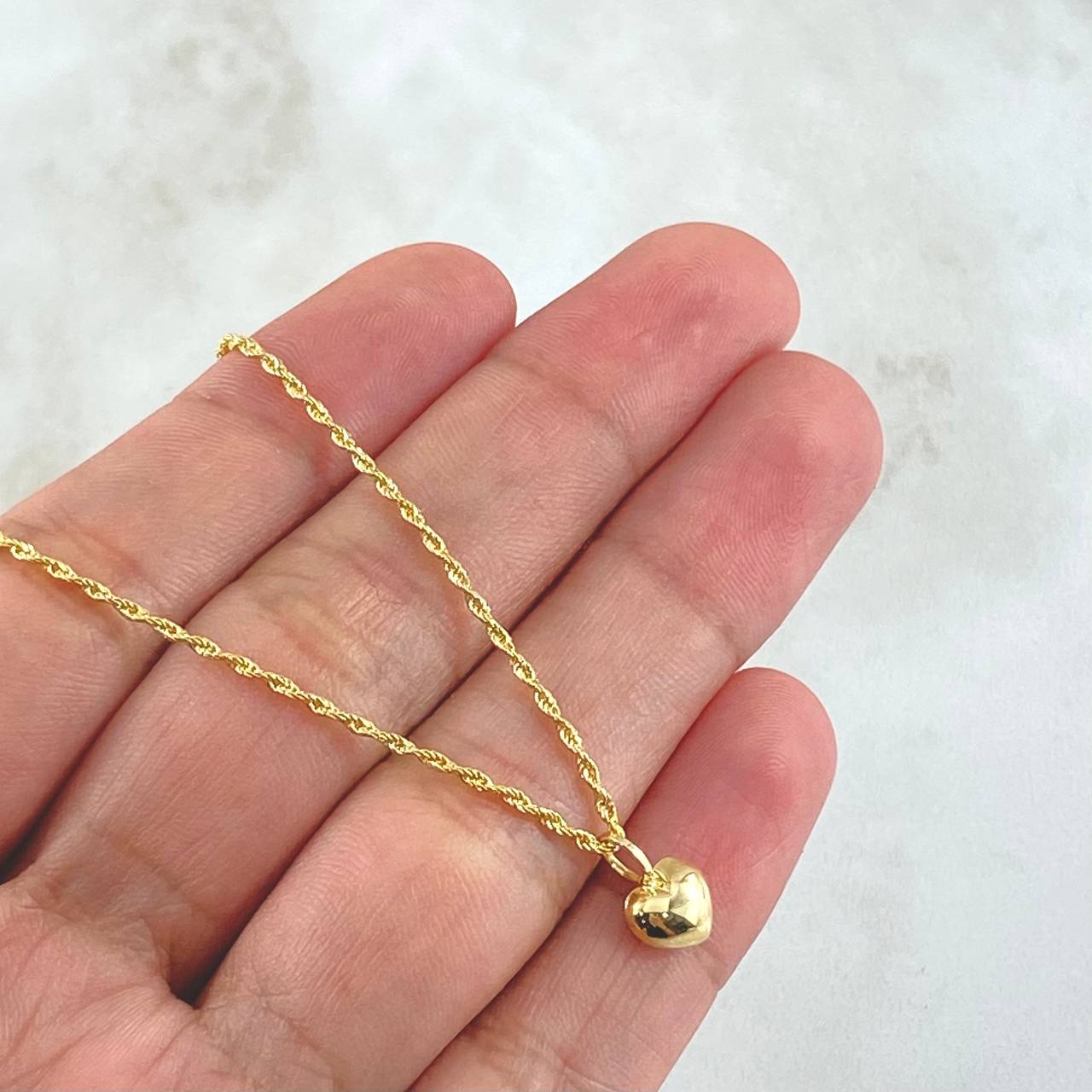 Set Rope Chain 0.95gr / 50cm / 1.2mm + Pendant Heart 0.3gr / 1cm Stamped 1.25gr 18K Yellow Gold (Offer)