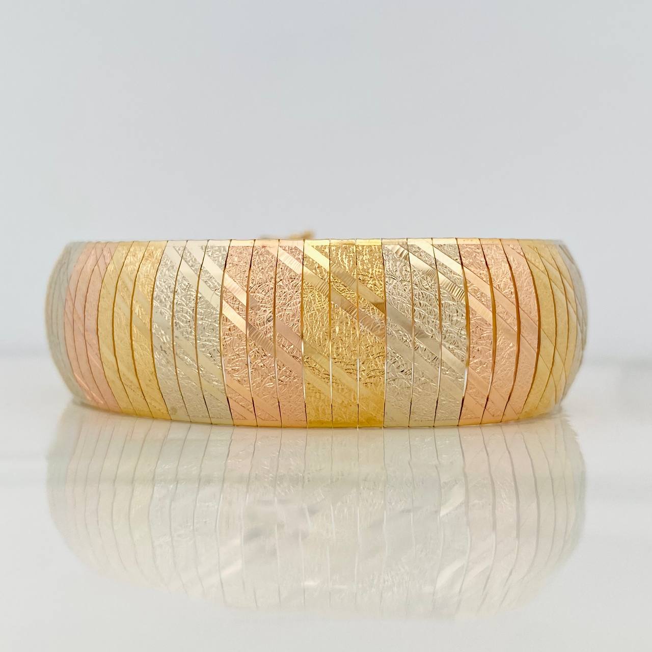 Pulso Destellos 38.5g / 7 3/4 in / 18.55mm Tres Oros 18K
