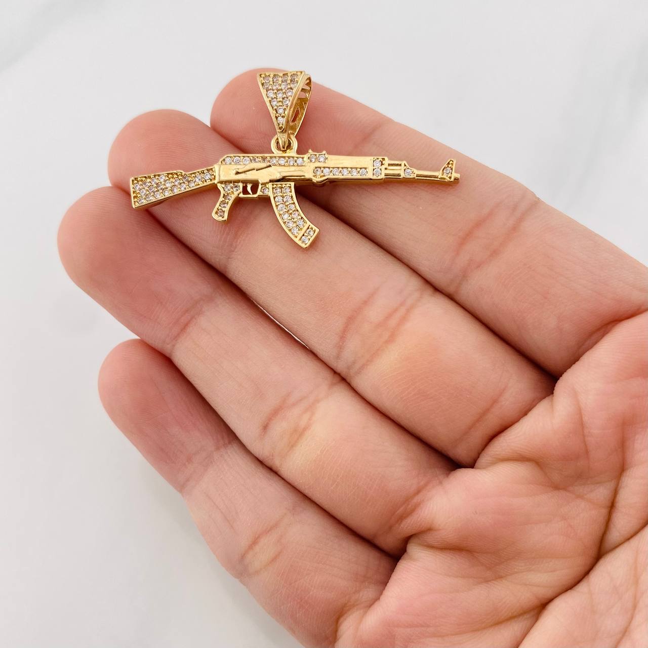 Dije Fusil 3.5g / 3/4 in Oro Amarillo 18K