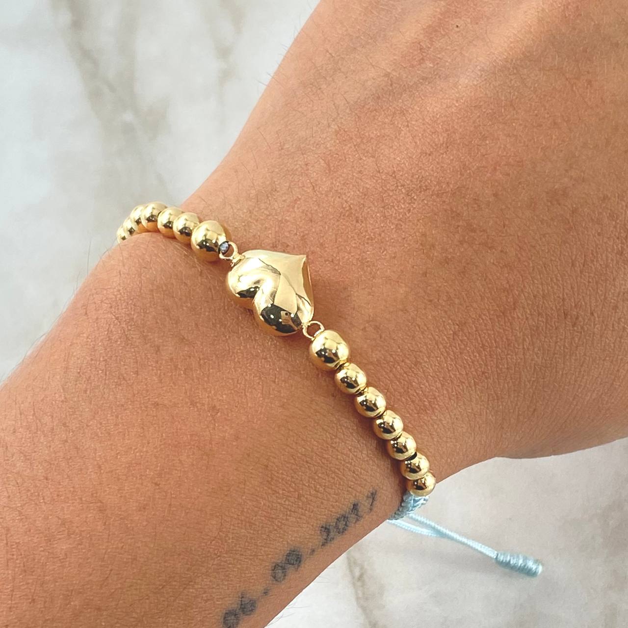 Pulsera Celeste Herraje Corazón Troquelado 2.25gr / 4mm-5mm Bolas Lisas 14 und Oro Amarillo 18K