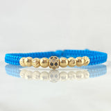Blue Bracelet Charm Bulged Cylinder White Black Zircons 1.25gr / 4mm Beads Diamond Cut 4 pcs Polished 4 pcs 18K Yellow Gold *