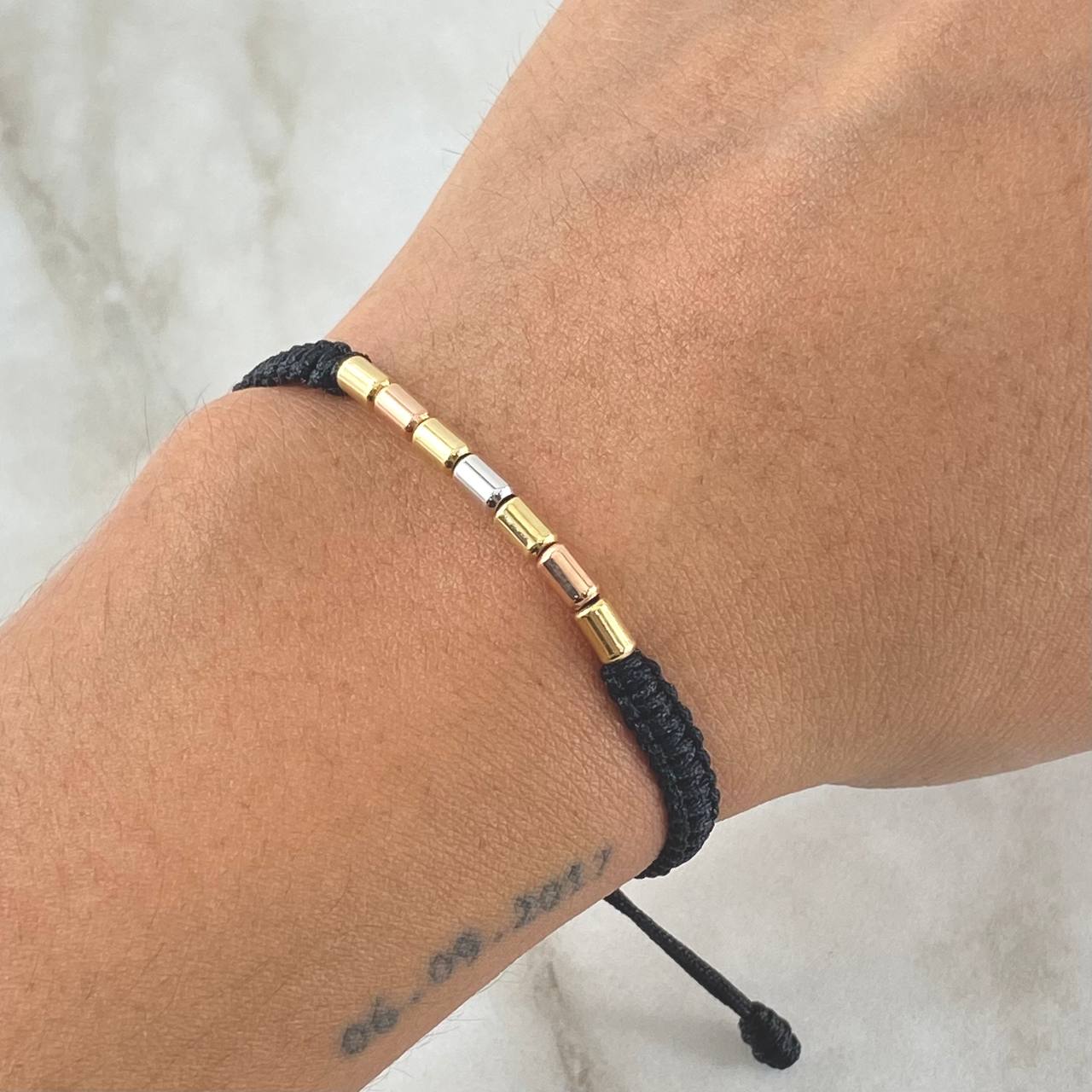 Pulsera Negra Cilindro 0.55gr / 3mm Lisos Tres Oros 18K *