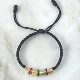 Pulsera Negra Herraje Rueda Circones Azul Verde Fucsia 4.4gr / 6mm Cilindros Diamantados 4 und Oro Amarillo 18K