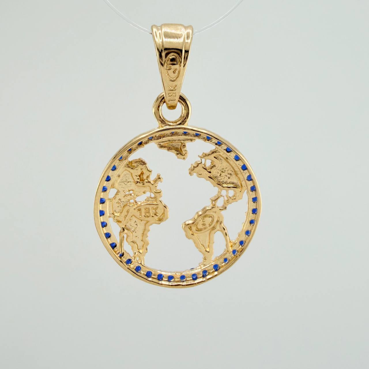 Dije Silueta Tierra 2gr / 1 in / Oro Amarillo 18K &