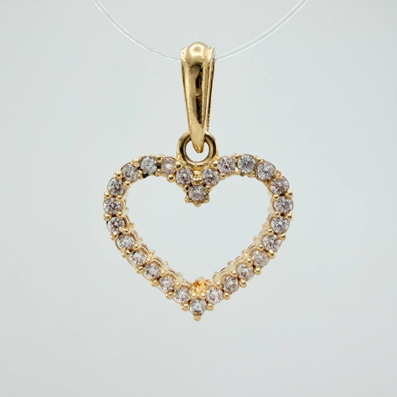 Dije Silueta Corazon Doble Faz 1.5gr / 3/4 in / Oro Amarillo 18K &