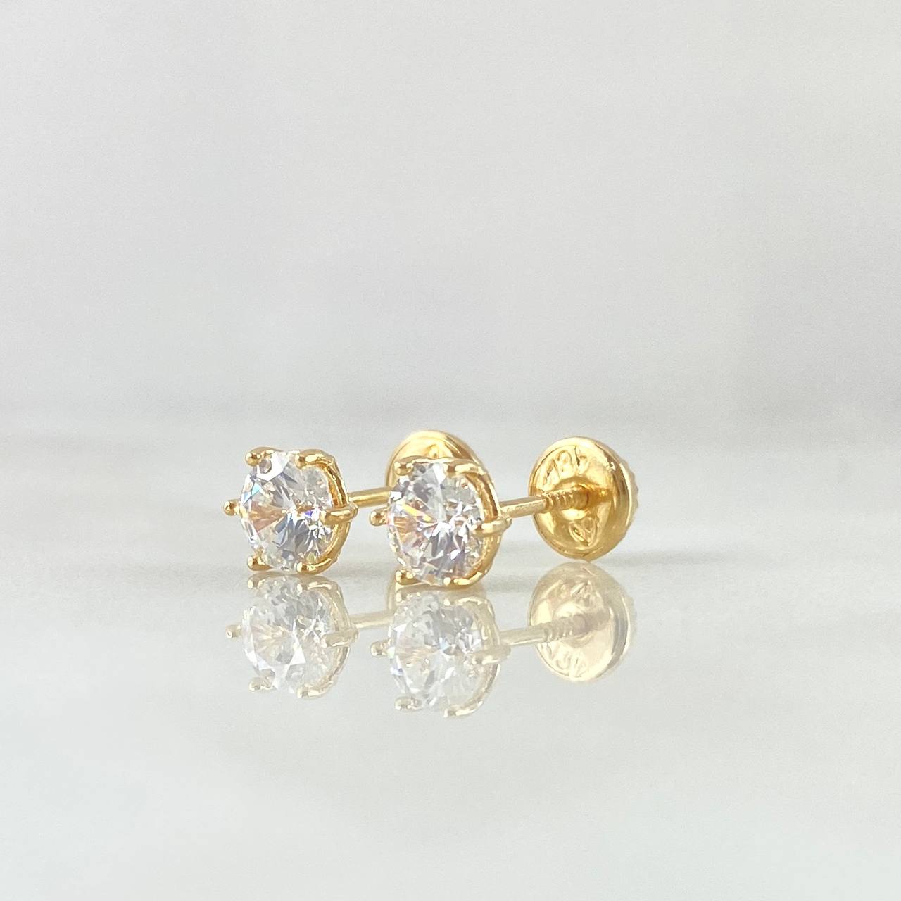 Topos Piedra Seis Garras 1.1gr / 5.4mm Circon Blanco Oro Amarillo 18K (Joya)
