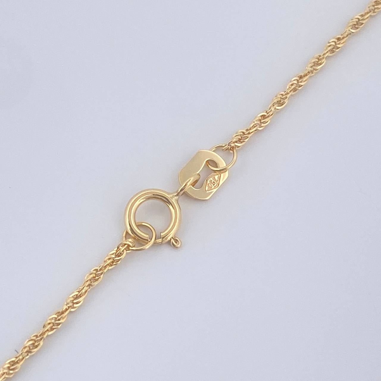 Set Cadena y Dije Lazo + Cruz 1.45gr / 15 3/4 in / Oro Amarillo 18K &
