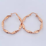 Candongas Tata 2.95gr / 1 1/2 in / Oro Rosa 18K $