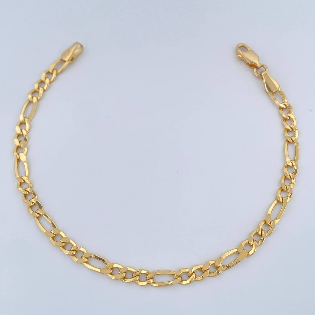 Pulso Figaro 3.55gr / 7 1/2 in / Oro Amarillo +1 18K &