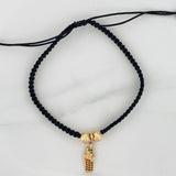Pulsera Tejida Negra San Jose 1.45gr / 6mm Dos Oros Amarillo Blanco 18K &