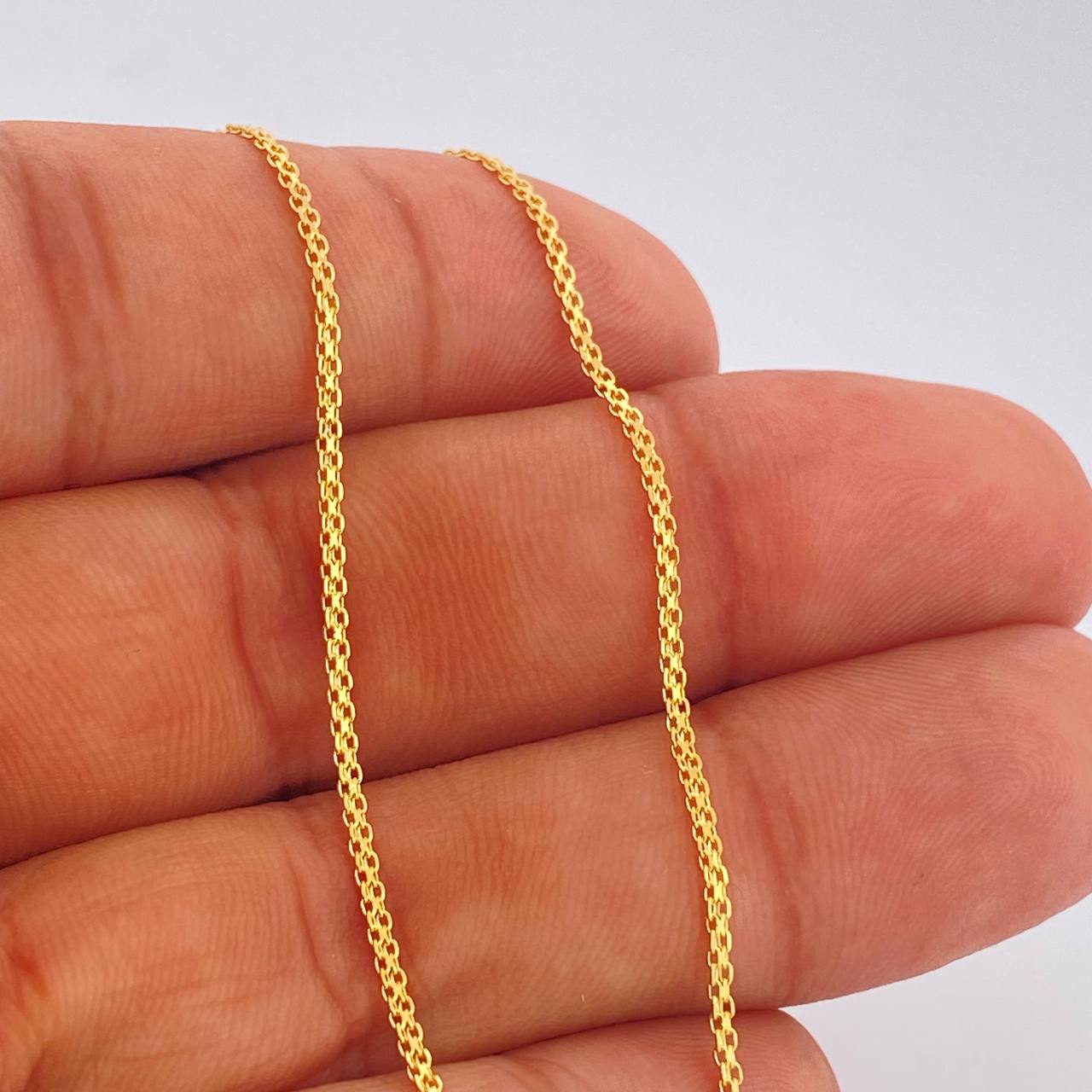 Cadena China 3.3gr / 23 1/2 in / Oro Amarillo +3 18K &