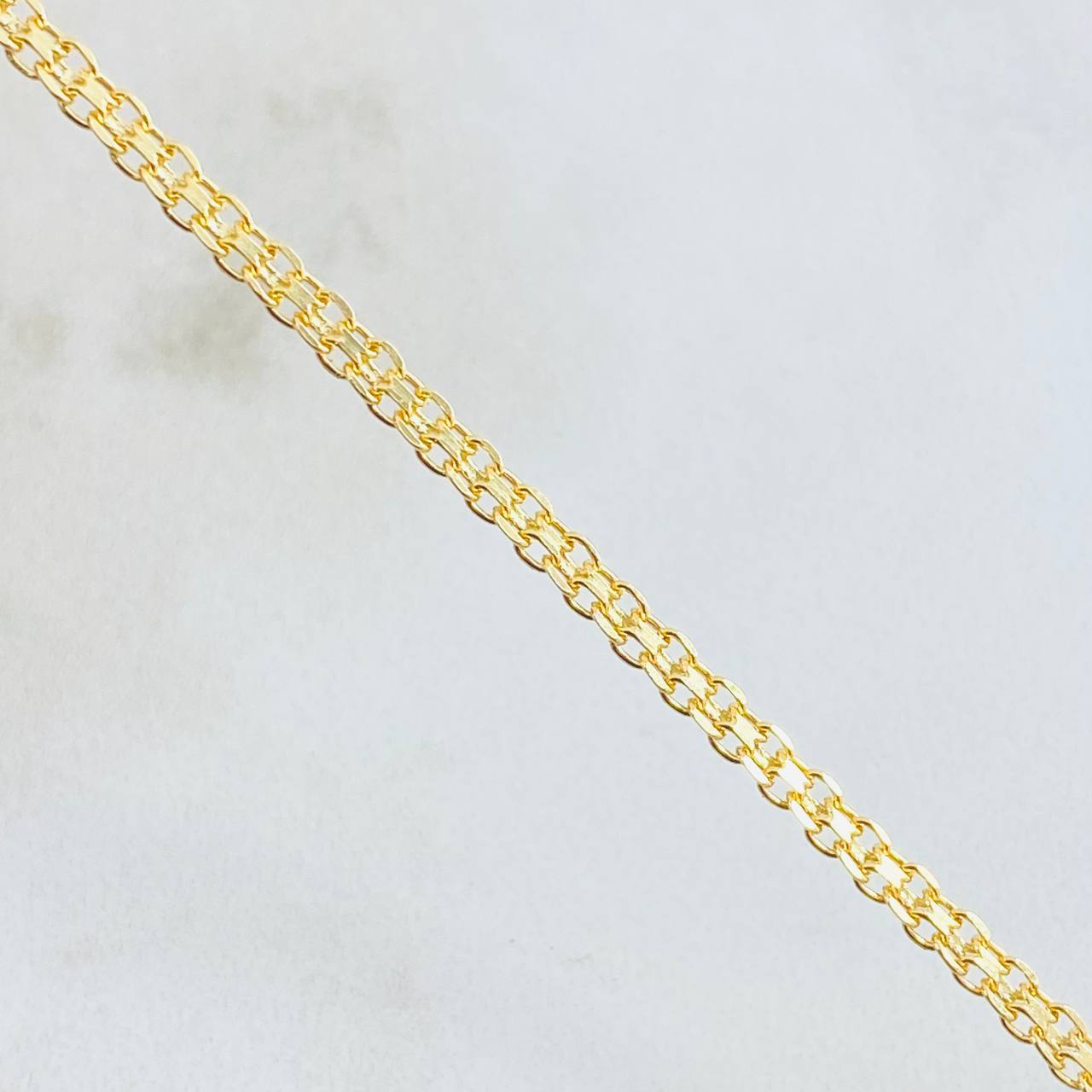 Cadena China 7.65gr / 23 1/2 in / Oro Amarillo +1 18K