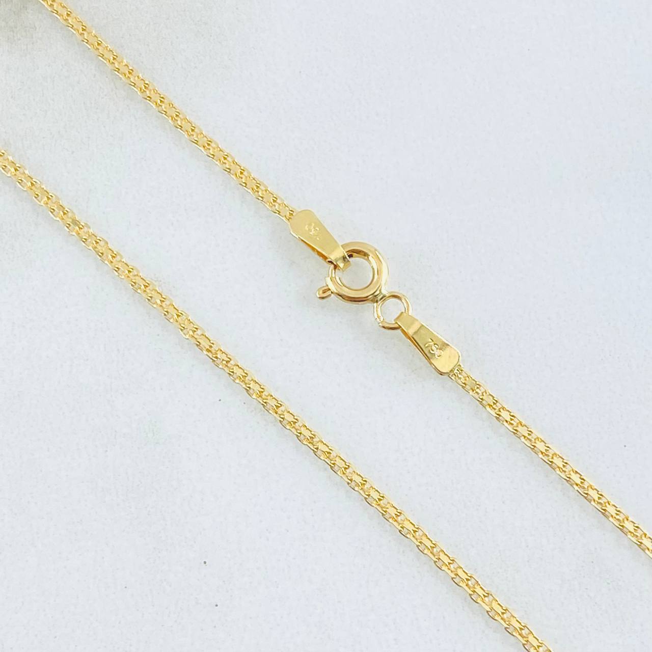 Cadena China 3.1gr / 23 1/2 in / Oro Amarillo +1 18K