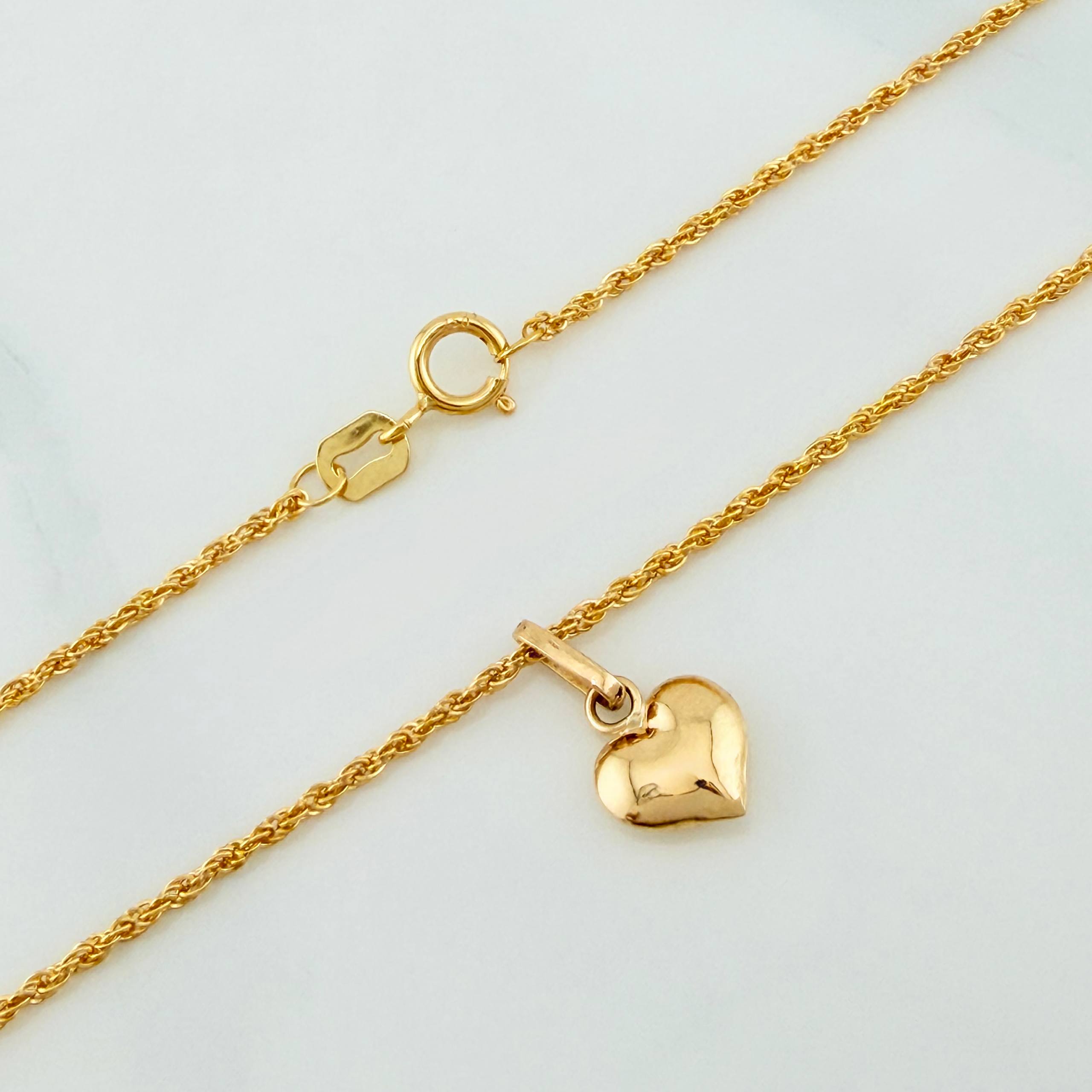 Set Cadena Lazo + Dije Corazon / 1,3 gr / 17 3/4 in Oro Amarillo 18K