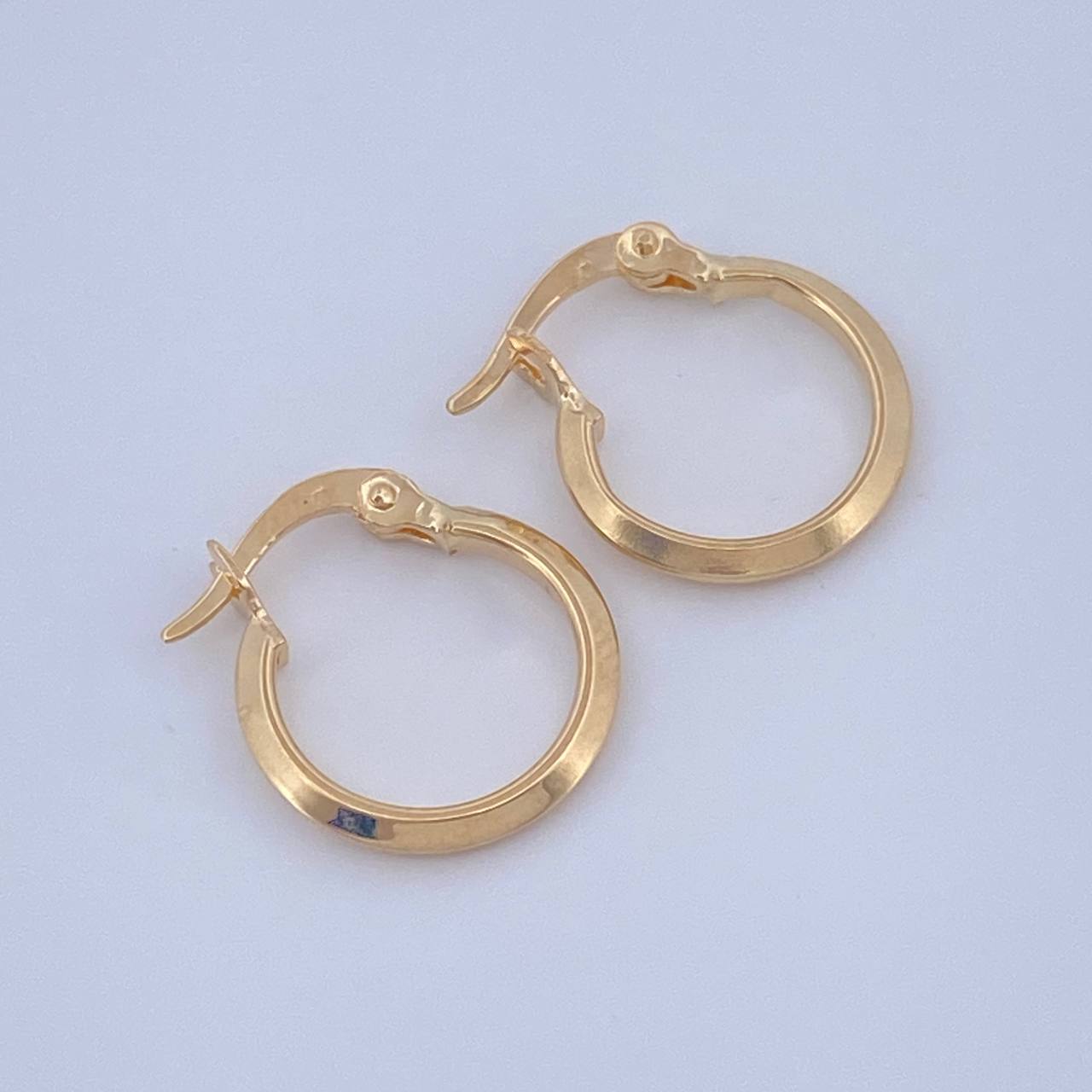 Candongas Clau 0.7gr / 1/2 in / Oro Amarillo 18K &