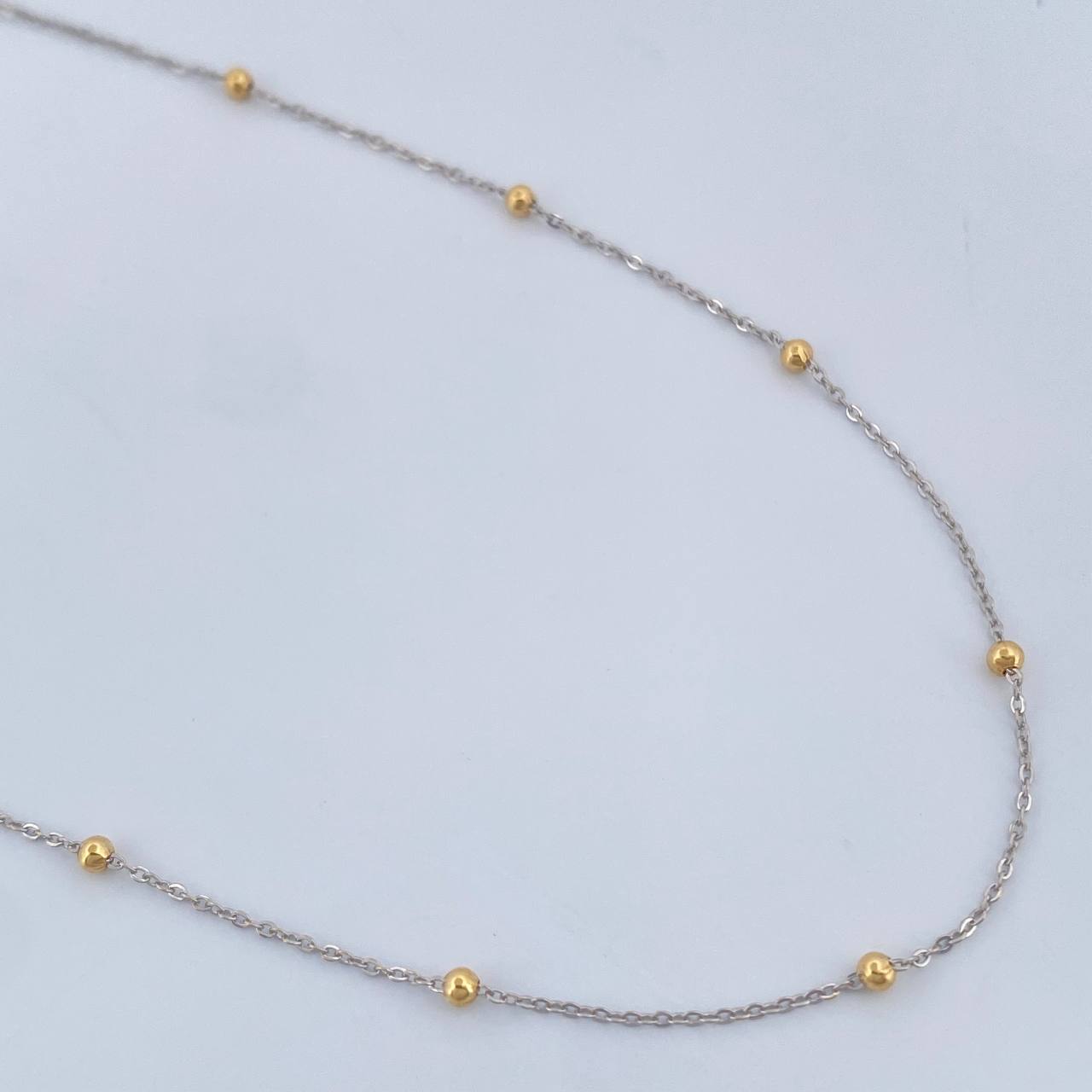Cadena Aro Seguido Bolas 1.15gr / 17 3/4 in / Dos Oros Amarillo Blanco +3 18K %