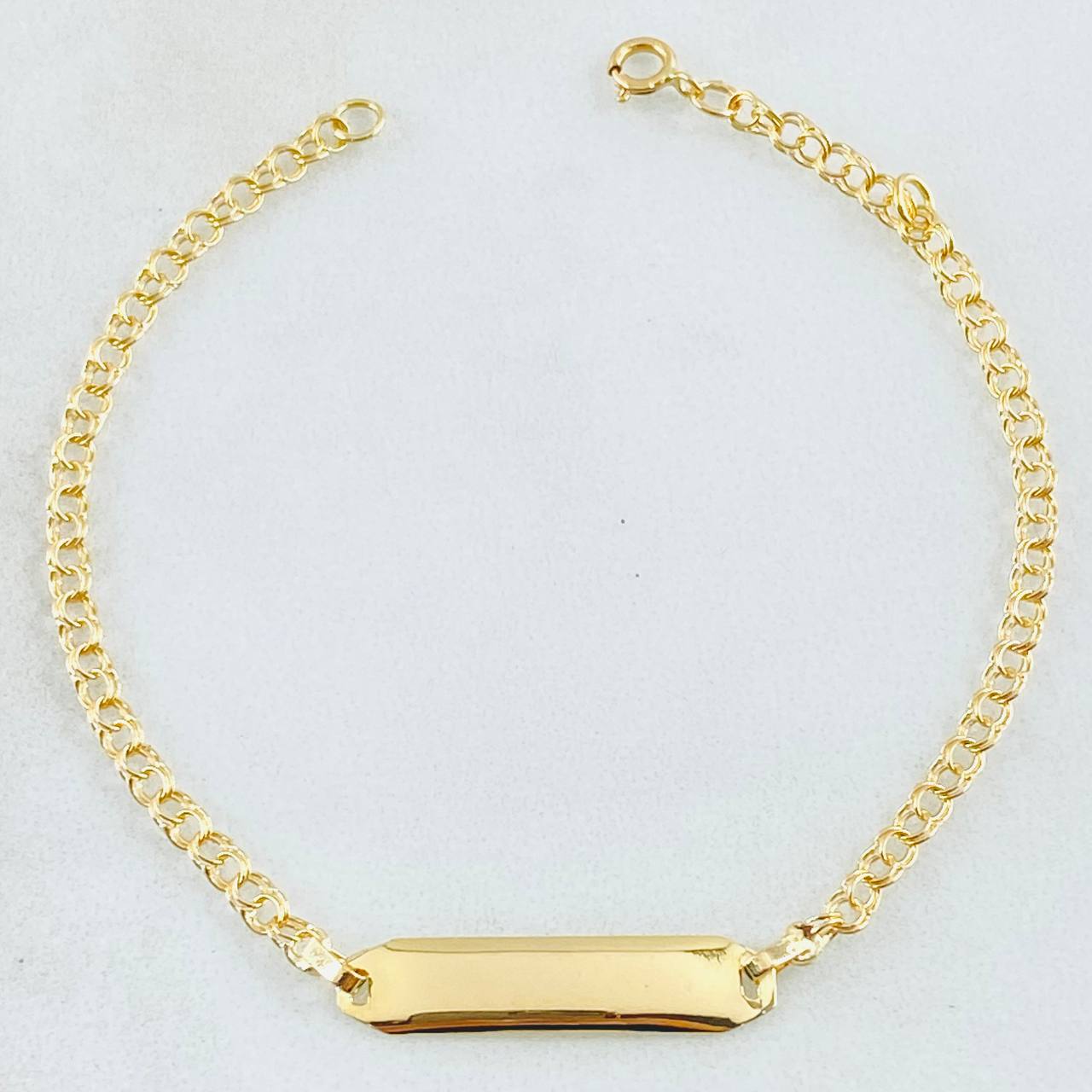 Pulso Bebé Aro Seguido Placa Rectangular  1.25gr / 5 1/2 in / Oro Amarillo 18K