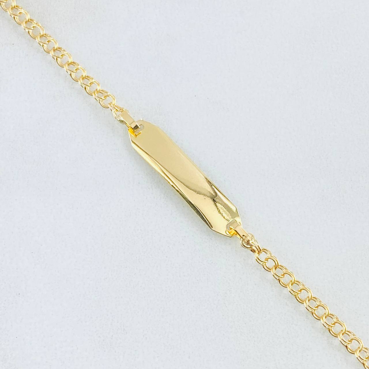 Pulso Bebé Aro Seguido Placa Rectangular 1.2gr / 5 1/4 in / Oro Amarillo 18K