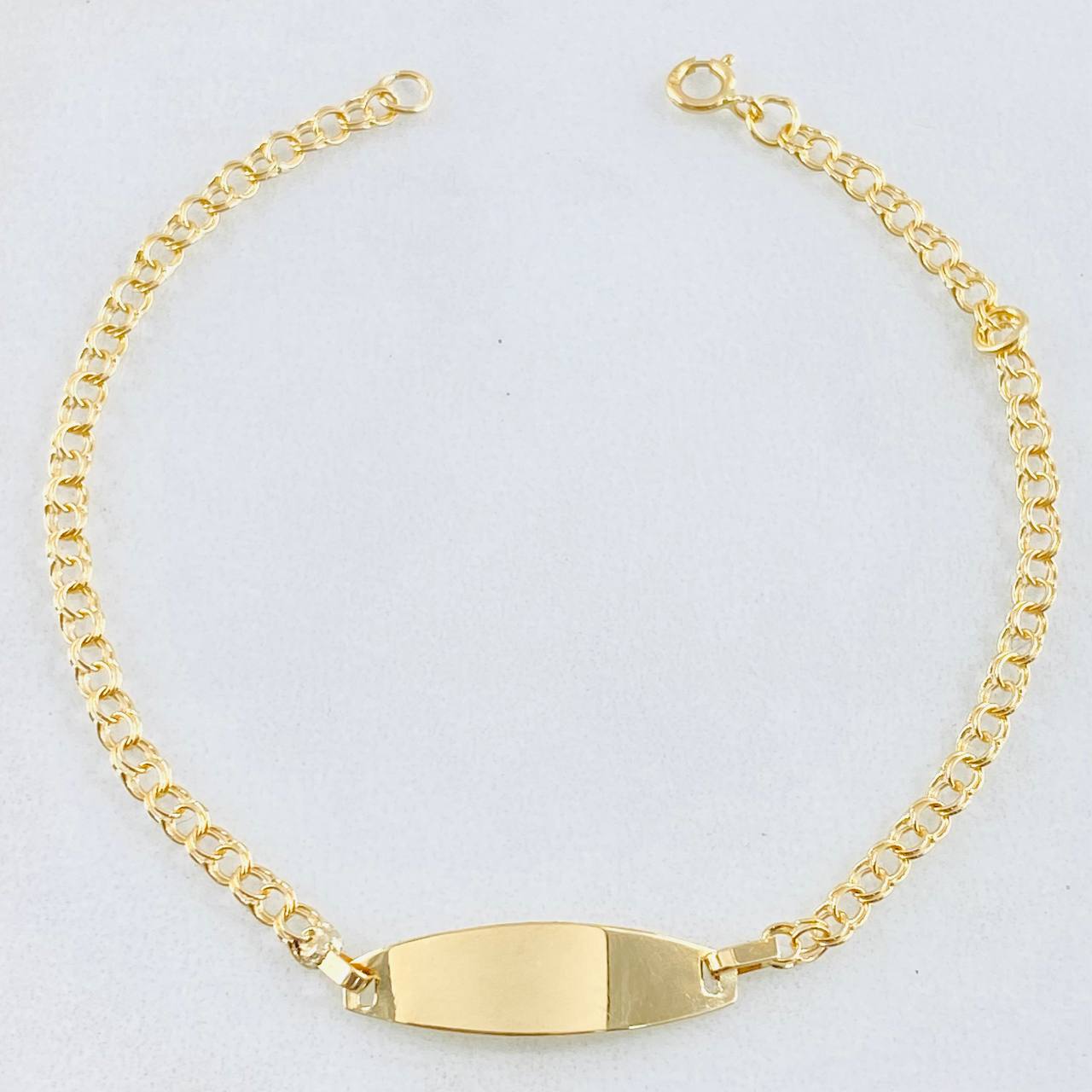 Pulso Bebé Aro Seguido Placa Rectangular Ovalada 1.3gr / 6 in / Oro Amarillo 18K ©
