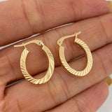 Candongas Ovaladas Rayadas 2.3 g / 3/4 in Oro Amarillo 18K
