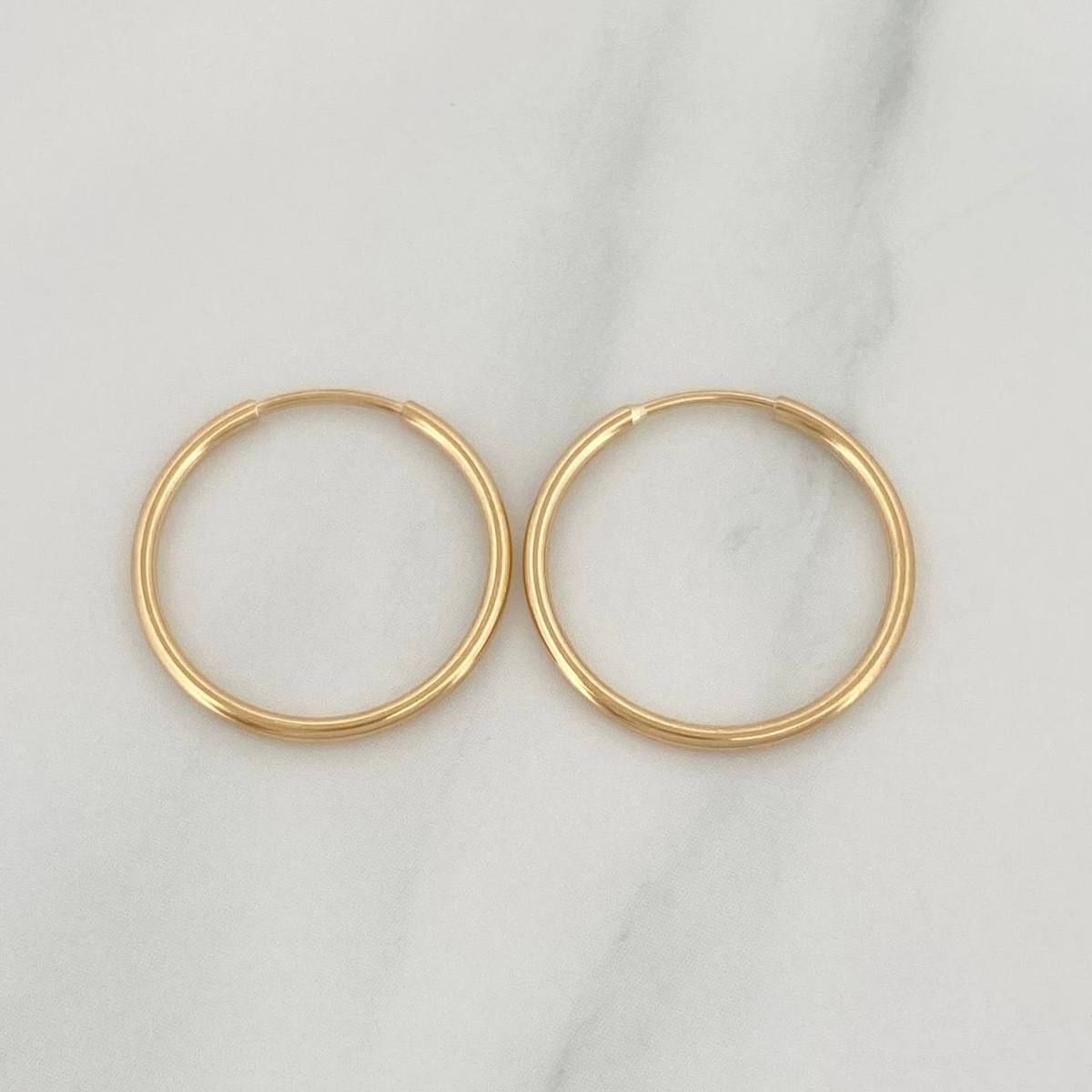 Candongas Mini Aro 0.8 g / 1/2 in Oro Amarillo 18K