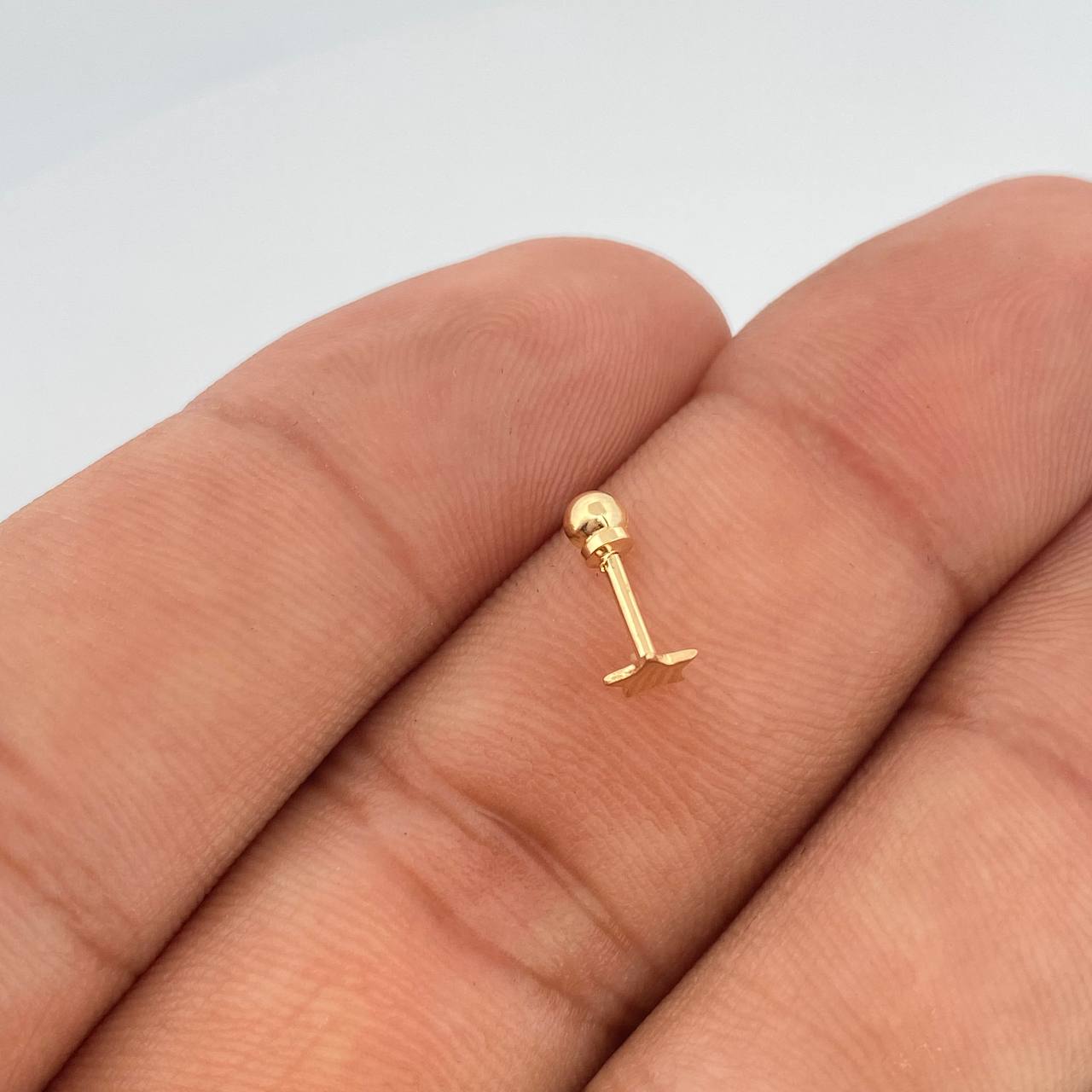 Piercing Estrella Plana 0.25gr / 1/2 in / Oro Amarillo 18K $